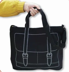 Black tote bag with white printed pocket and strap outlines