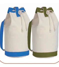 Two cream drawstring bags with blue and green trim and shoulder straps