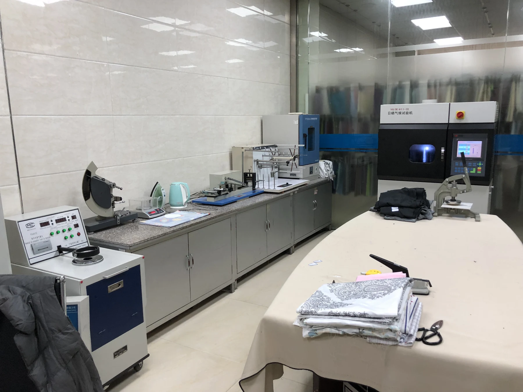 Textile testing equipment and fabric samples in a laboratory