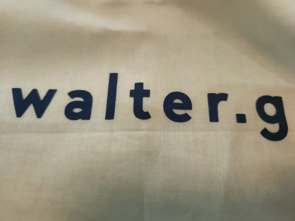 Walter G logo screen printed on a white cotton packaging bag